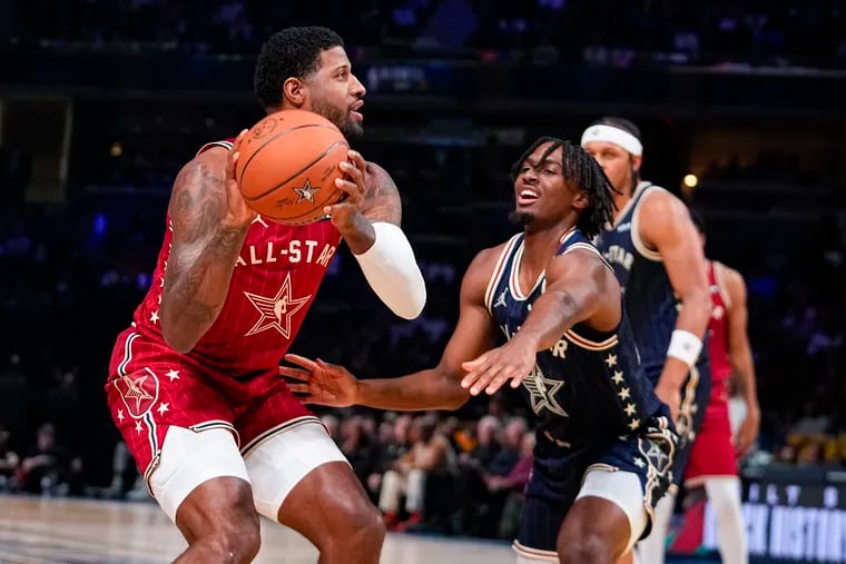 Sixers guard Tyrese Maxey defends against Paul George of the Los Angeles Clippers during the first half of the NBA All-Star Game.