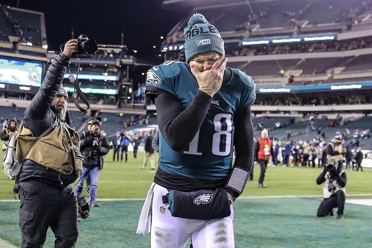 Eagles quarterback Josh McCown, center, leaves Lincoln Financial Field, visibly upset, after the Eagles 17-9 loss to the Seahawks on January 5, 2020, at Lincoln Financial Field.