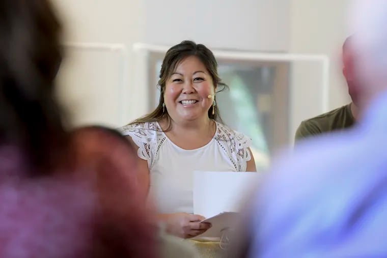 Pastor Juliet Liu of Life on the Vine church speaks during a congregational meeting in Long Grove, Ill., on Sunday, May 22.