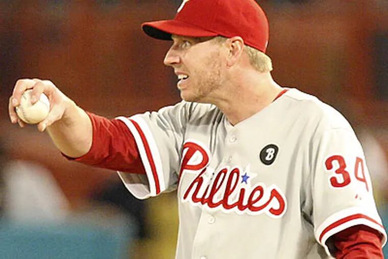 The Phillies wasted Roy Halladay's strong effort by leaving 10 runners on base. (David Santiago/El Nuevo Herald/AP)