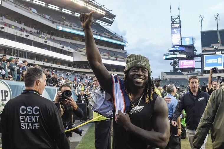New Eagles running back Jay Ajayi acknowledges the fans as he leaves Lincoln Financial Field after the team’s victory over the Broncos.