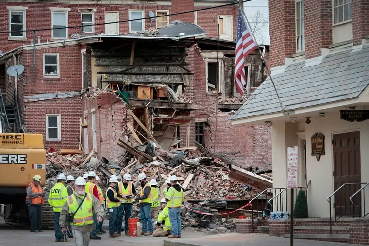 Rubble at the site of the R.M. Palmer chocolate factory in West Reading, Pa. on March 27, 2023. On Friday, an explosion at the factory left seven people dead.