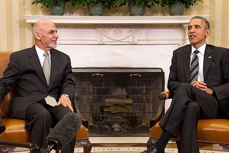 President Obama with Afghanistan President Ashraf Ghani in the Oval Office. JACQUELYN MARTIN / AP
