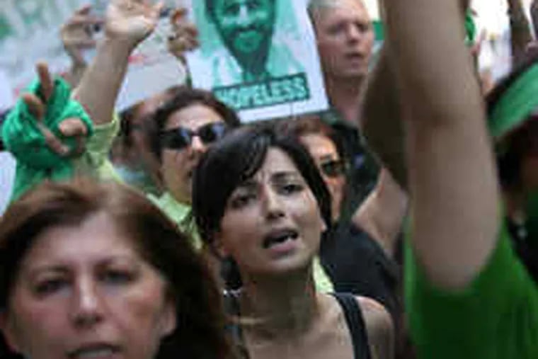 Fatima Khanoam of San Francisco chanted at a rally in New York City against the Iran government. At least 80 cities took part.