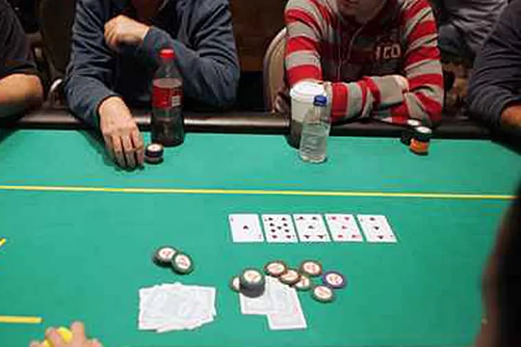 A poker game at the Borgata in Atlantic City, N.J. A bill to legalize table games in Pa. would bring revenue to the state. Critics warn that "pet" projects would also benefit. (Bonnie Weller/Staff/File)