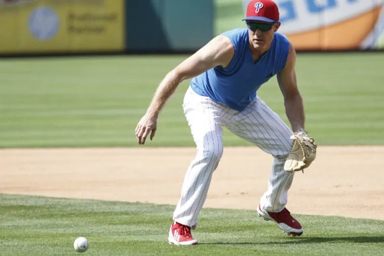 Chase Utley does some work in the field before Wednesday's game.