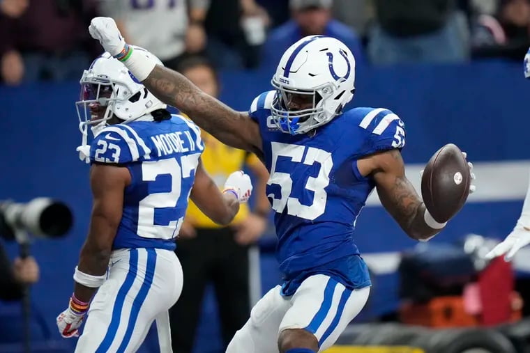Colts linebacker Shaq Leonard celebrates after intercepting a pass against the New England Patriots in December 2021.