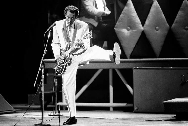Chuck Berry performs during a concert celebration for his 60th birthday at the Fox Theatre in St. Louis in 1986. Berry, a rock and roll legend, died Saturday.