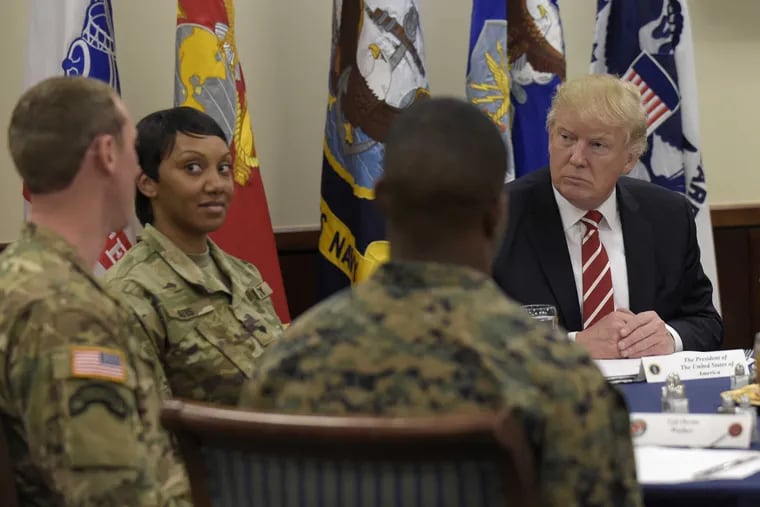 President Donald Trump has lunch with troops while visiting U.S. Central Command and U.S. Special Operations Command at MacDill Air Force Base, Fla., Monday, Feb. 6, 2017.