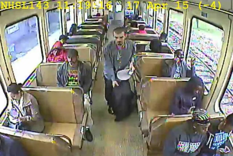 The man in the aisle is being sought by Radnor police for a burglary.
