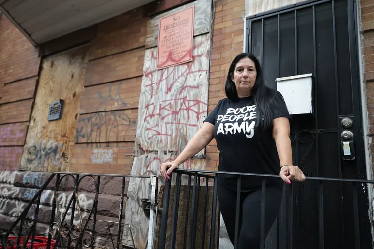 Cheri Honkala, an advocate for the homeless, poses for a portrait outside her home in Philadelphia, Pa. on September 17, 2020.