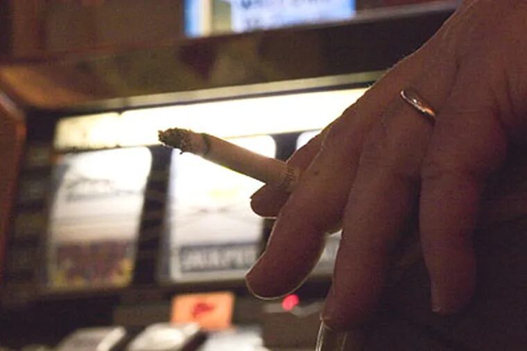 Gambling interests won an exemption from a 2008 state indoor smoking ban. (David M Warren / Staff Photographer)