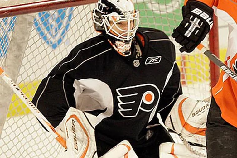 Johan Backlund originally signed a one-year contract with the Flyers in March 2009. (Yong Kim/Staff file photo)