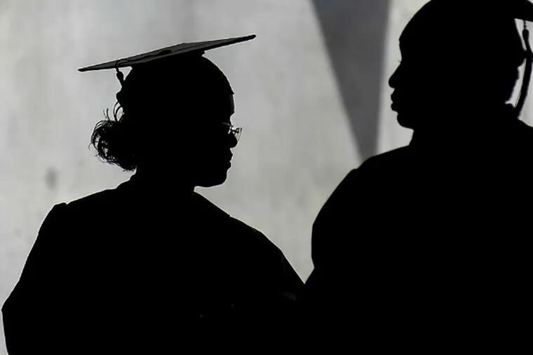 Community College of Philadelphia students wait to receive their degrees in 2007.