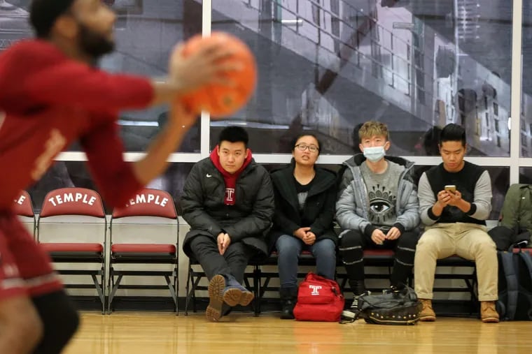 Studying up at a Temple practice were (from left) Shizhe You, Metsky Liu, Javi Yuan, and James Yuan. A fifth student, Echo Chen, will also be trying out. Broadcasts will be streamed on Owl Sports, with highlight reels on YouTube and Youku - China's YouTube.