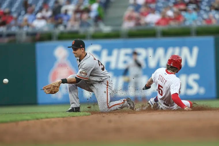 Phillies’ Bryson Stott steals second base easily against Giants’ third baseman Jason Vosler during the 3rd inning at Citizens Bank Park in Philadelphia, Wednesday,  June 1, 2022