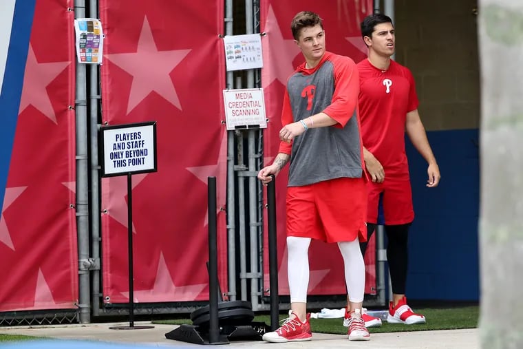 Phillies outfielders Mickey Moniak, left, and Adam Haseley work out during spring training in 2020.