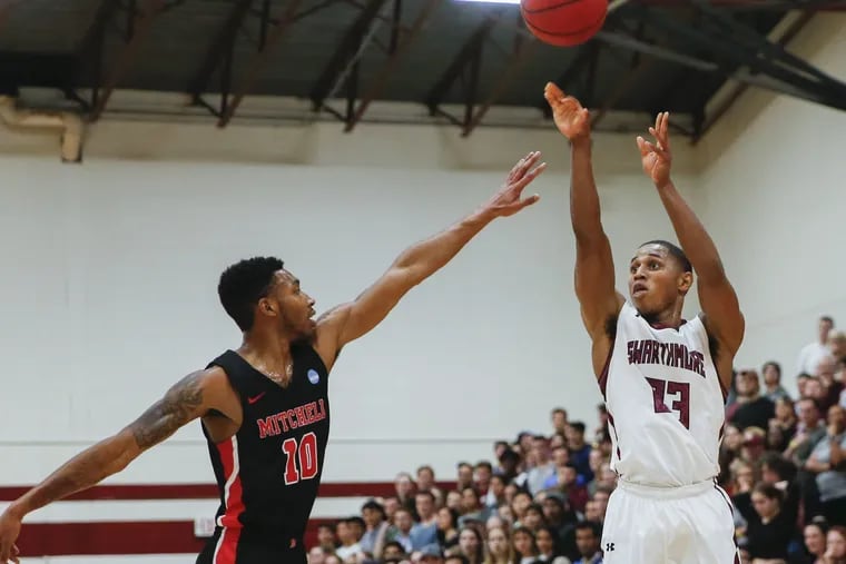 Swarthmore guard Cam Wiley, the team's leading scorer, shoots in a victory over Mitchell's Steffen Brunson  on March 1.