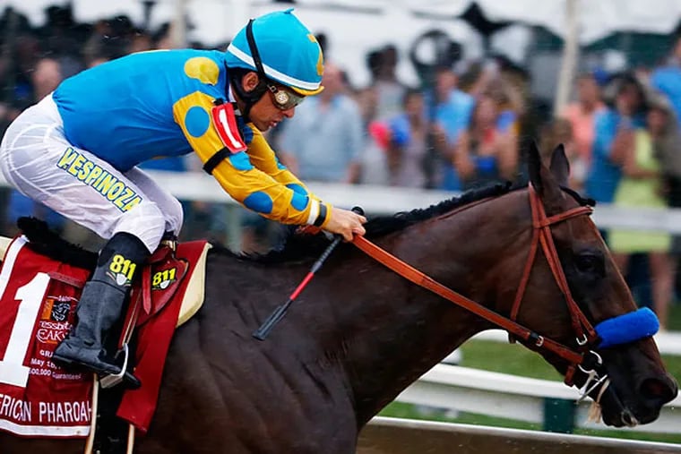 Victor Espinoza aboard American Pharoah during the 140th Preakness Stakes at Pimlico Race Course. (Geoff Burke/USA Today)