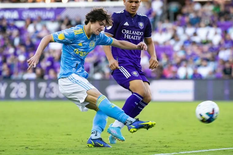 Paxten Aaronson (left) taking a shot during the first half of the Union's U.S. Open Cup loss at Orlando City on Tuesday.