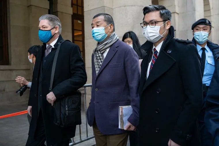 Hong Kong media tycoon Jimmy Lai, founder and owner of Apple Daily newspaper, leaves the Court of Final Appeal for a lunch breaking after his hearing on Dec. 31, 2020, in Hong Kong. On Saturday, the editor and publisher of the Apple Daily newspaper were arraigned.