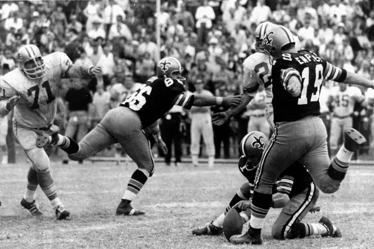 Tom Dempsey (19) kicks a record-setting 63-yard field goal for the New Orleans Saints in their 19-17 win over the Detroit Lions on Nov. 8, 1970. Dempsey passed away last weekend due to complications from the coronavirus.