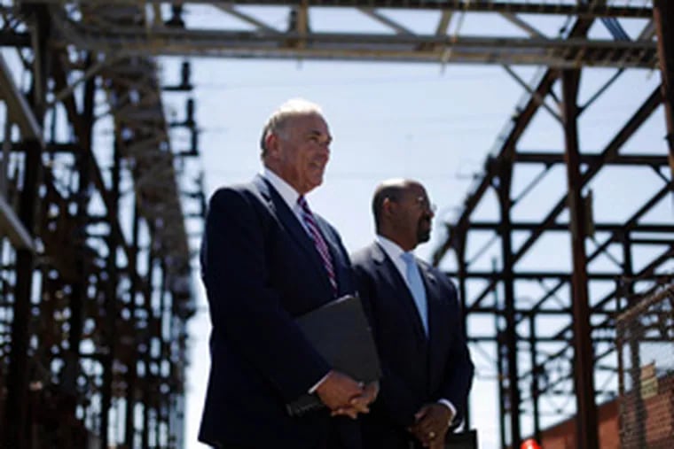 Gov. Rendell and Mayor Nutter at SEPTA's Wayne Junction substation, built in 1931. They called for more funding for the area's aging rail system and highways. &quot;This is a call to arms,&quot; Nutter said. &quot;This is a serious issue that must be addressed.&quot; He said needs would get worse if legislators did not act. (Matt Rourke / Associated Press)