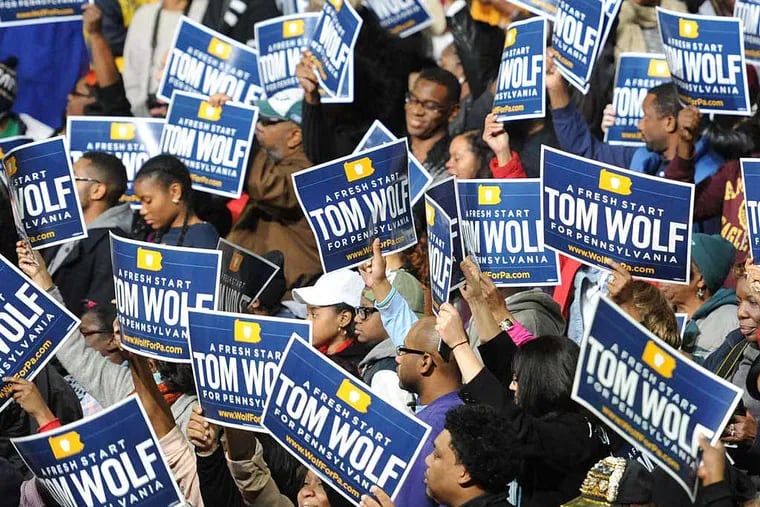Wolf pack: Fans of the governor-elect at Temple last week.