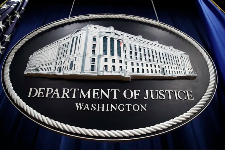 In this Thursday, April 18, 2019, file photo, a sign for the Department of Justice hangs in the press briefing room at the Justice Department, in Washington.  Government officials like those at the DOJ have gotten an unfairly bad reputation as agents of the "deep states," writes former Assistant U.S. Attorney Michael Levy.