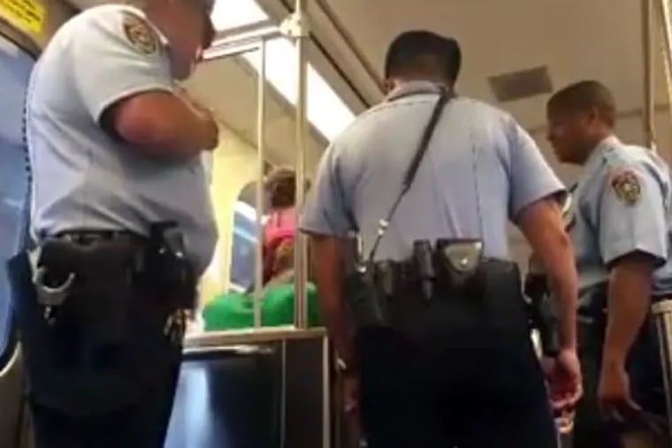 Ellis Smith, 20, was sitting with his daughter on his lap when officer William Crawford got on the train at the Erie-Torresdale stop. (Source: MrChesjr's YouTube channel)