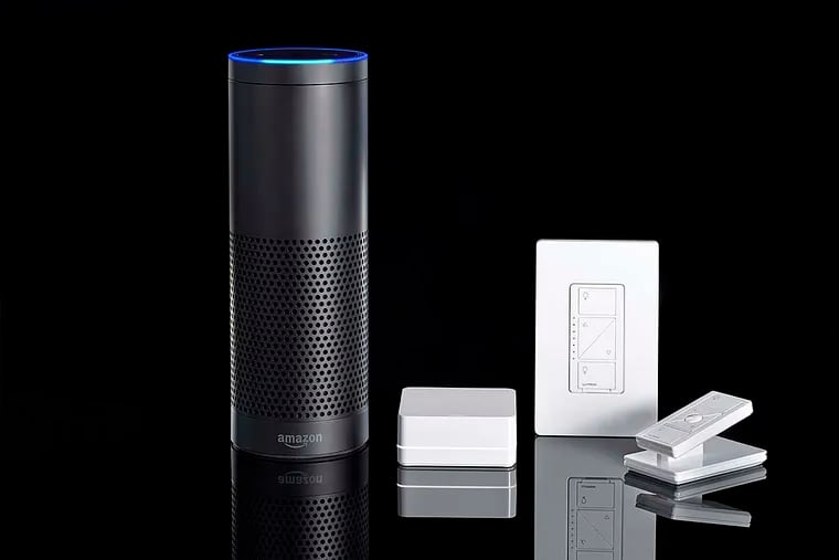 Lutron’s Caseta starter kit (right) and Amazon’s Echo speaker. The two can be paired to control home lighting.