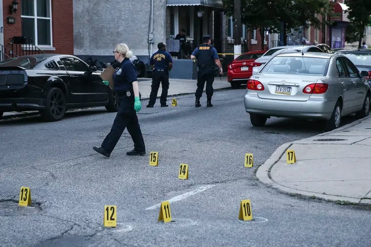 22nd District police and the crime scene unit working a large crime scene that left one man fatally shot and another man with multiple gunshot wounds listed in critical condition. Some of the 68 shell casing from both pistol and rifle shown here at the scene.  Monday, May 30, 2022
