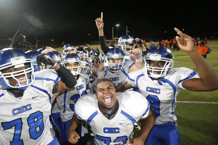 Conwell-Egan players celebrate after their 14-12 victory over Del-Val in the 3A District 12 Championship on Nov. 5, 2016.