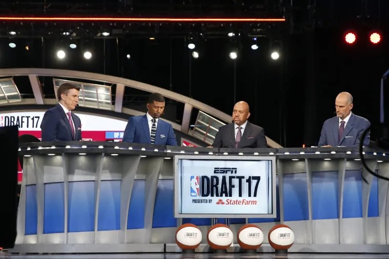 ESPN 2017 NBA draft host Rece Davis (left) and analysts (from left to right) Jalen Rose, Michael Wilbon and Jay Bilas on the network’s set at the Barclays Center in Brooklyn, N.Y.