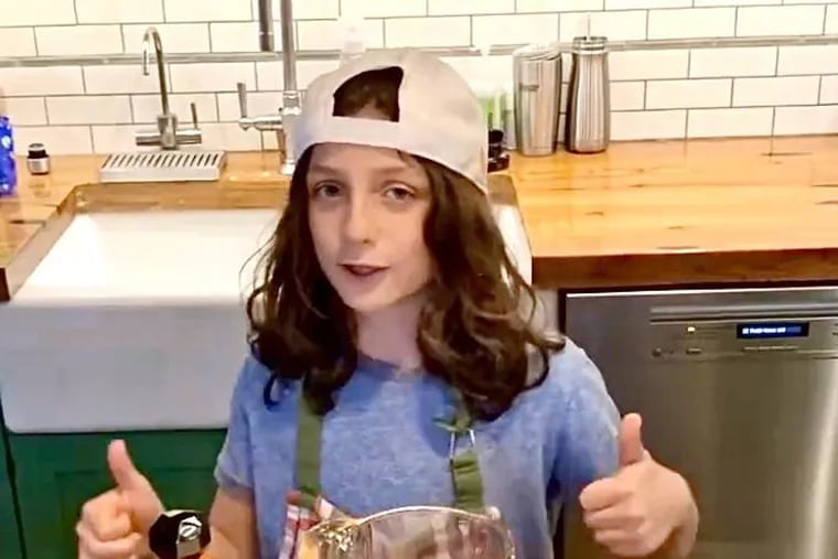 Mario Vetri, 10, shoots a cooking video.