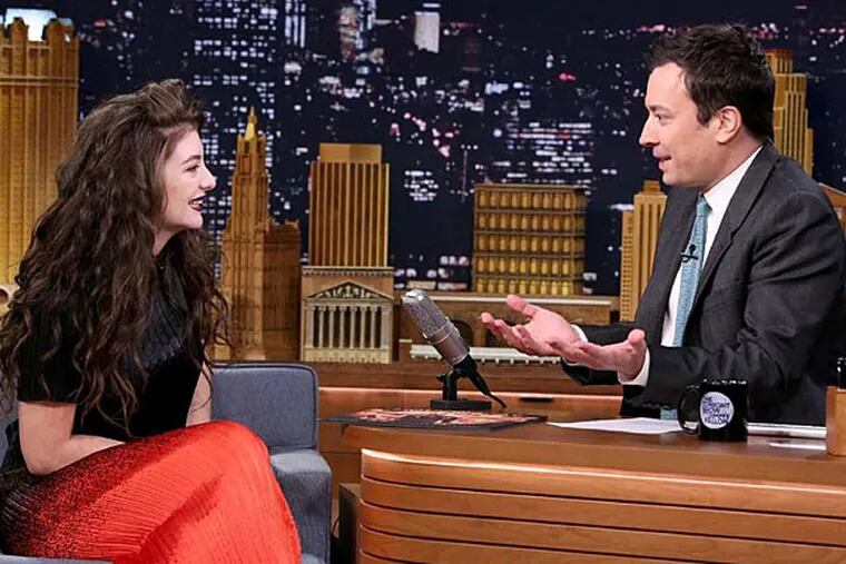 Lorde told 'Tonight' host Jimmy Fallon that she and Taylor Swift met and bonded over milkshakes. (DOUGLAS GORENSTEIN / NBC)