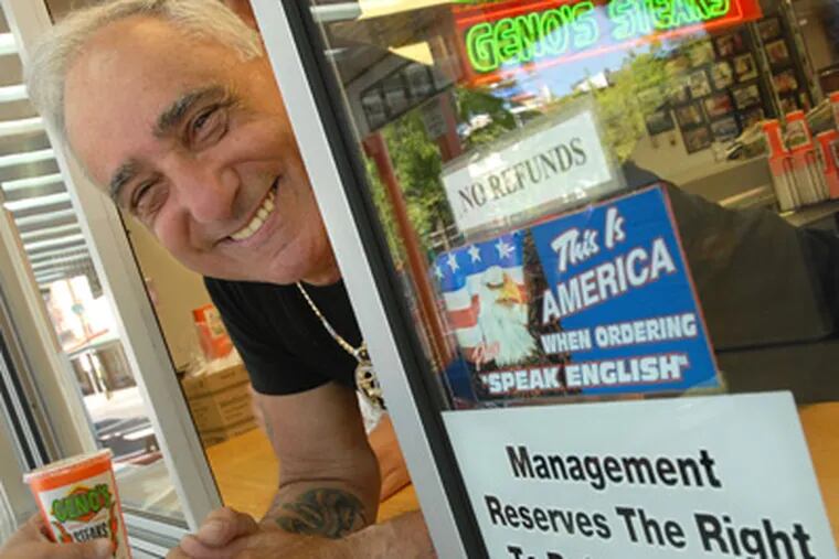 Joe Vento, 66, owner of Geno's Steaks, May 23, 2006 with a sign "This is America.  When Ordering, Speak English."  (Photo: Inquirer files)
