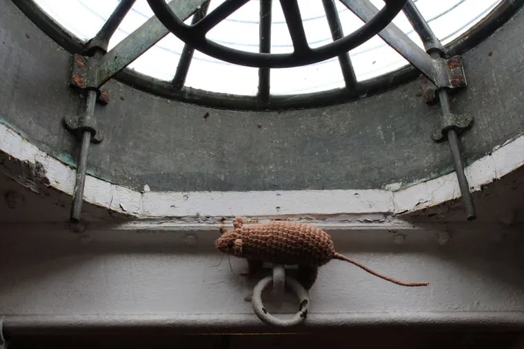 Crocheted life-size rats by Joan Menapace were a surprise in the exhibition aboard the cruiser.