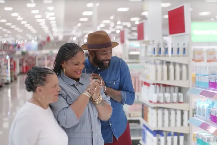 Honey Pot founder, Beatrice Dixon (middle) gushes at her Target line as part of a Target commercial that celebrates Women's History Month and Black History Month.