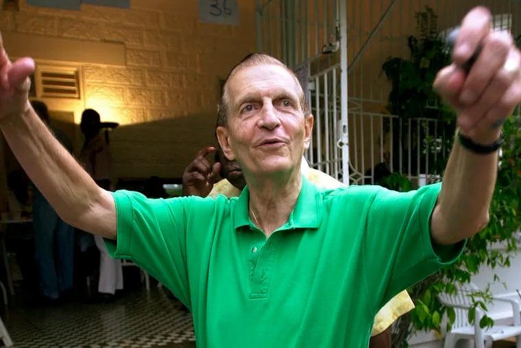 FILE - In this Oct. 16, 2002 file photo, former Jamaican Prime Minister Edward Seaga leaves a polling station after voting in the general election, in Kingston, Jamaica. Seaga, who shaped the island’s post-independence politics and cultural life, died Tuesday, May 28, 2019. Seaga was 89.
