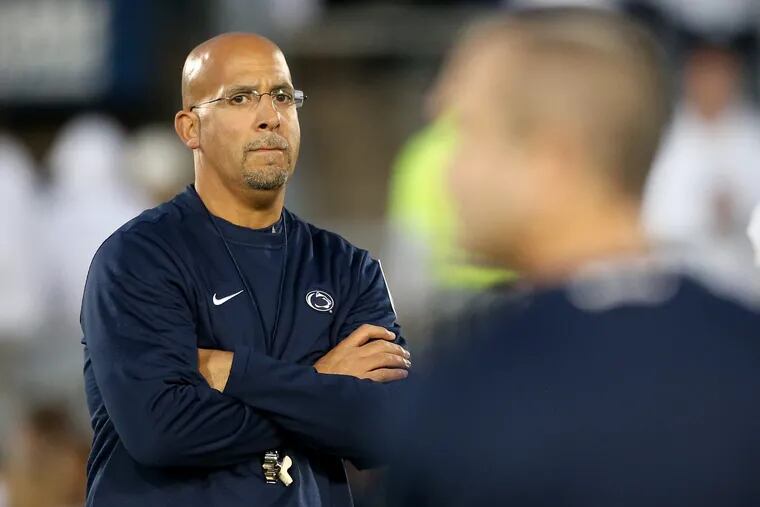 Penn State head coach James Franklin watches his players warm up before a game against Ohio State at Penn State University's Beaver Stadium on Saturday, Sept. 29, 2018. TIM TAI / Staff Photographer