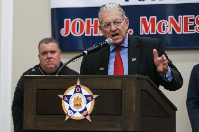 George Bochetto kicks off his Republican campaign for U.S. Senate in Pennsylvania at the local police union headquarters Thursday in Northeast Philadelphia. FOP Lodge President John McNesby stands behind him, left.
