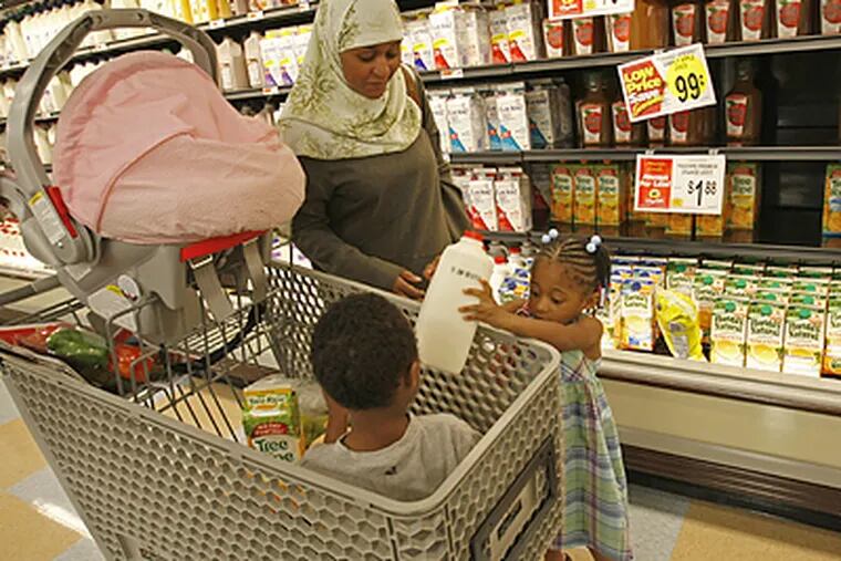 The new ShopRite supermarket in Parkside acknowledges a range of tastes, from West Indian food to products permissible under Islamic law. (Michael S. Wirtz/Inquirer)