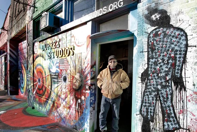 Artist James Dupree in front of Dupree Studios, at 3617 Haverford Ave.
