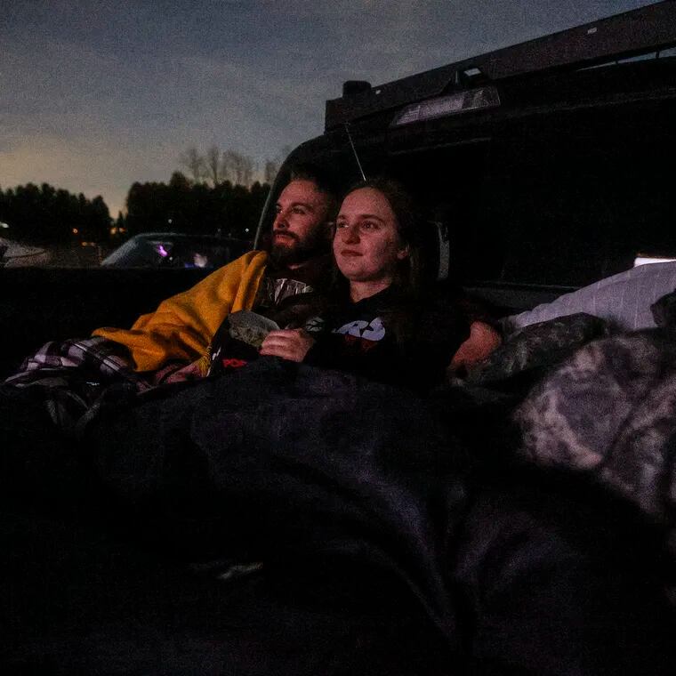 Sitting in the back of a pick-up truck Dustin Roberts left and Ashlyn Rimsky from Walnutport watch the movie Leprechaun  playing at the Shankweiler's Drive-In, near Allentown, in Orefield, PA, was the second drive-in built in the U.S. (Camden was first). On April 13, the drive-in will celebrate its 90th anniversary. Friday, March 15, 2024.