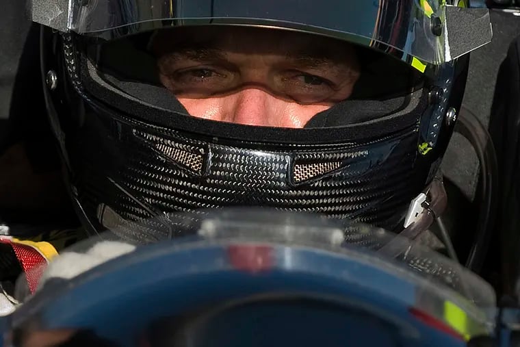 FILE- In this March 19, 2010, file photo, Level 5 Motorsports driver Scott Tucker waits during a break in a practice session for the American Le Mans Series' 12 Hours of Sebring auto race in Sebring, Fla. A U.S. appeals court has upheld a nearly $1.3 billion award against a pro racecar driver who ran a payday loan business accused by federal authorities of deceiving consumers. A unanimous three-judge panel of the 9th U.S. Circuit Court of Appeals ruled Monday, Dec. 3, 2018, that information Scott Tucker provided consumers did not accurately disclose the terms of the loans. The appeals panel also said a lower court did not abuse its authority when it ordered Tucker and other defendants to pay back nearly $1.3 billion. (AP Photo/Steve Nesius, File)