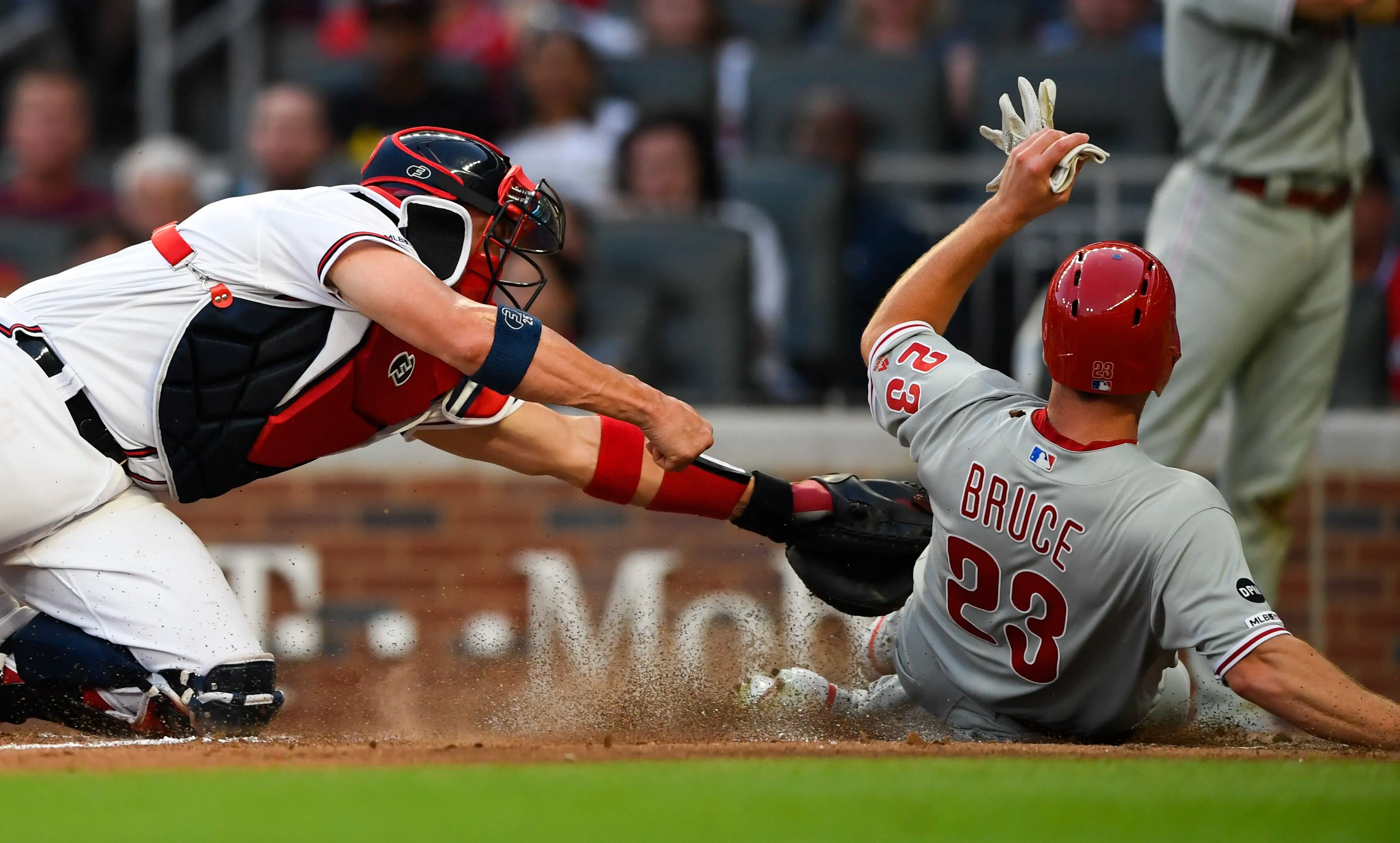 Jay Bruce, J.T. Realmuto both injured, out for series finale against Braves