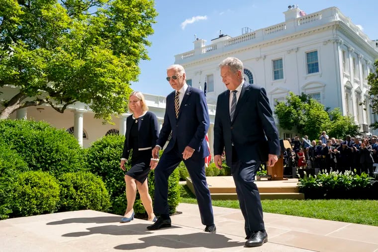 President Joe Biden departs with Swedish Prime Minister Magdalena Andersson, left, and Finnish President Sauli Niinisto, right, after speaking in the Rose Garden at the White House on Thursday.