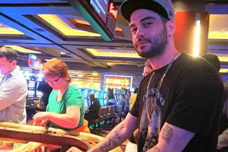 Craps player Nick Giron, 28, of Prince George's County, Md., said with nearby Maryland Live! Casino now with table games he will be cutting back on his trips to Atlantic City. (By Suzette Parmley)