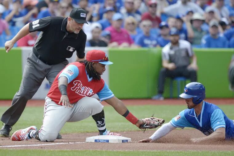 Maikel Franco (here tagging out Toronto's Randal Grichuk) and the Phillies have a favorable schedule ahead as they pursue a playoff spot.